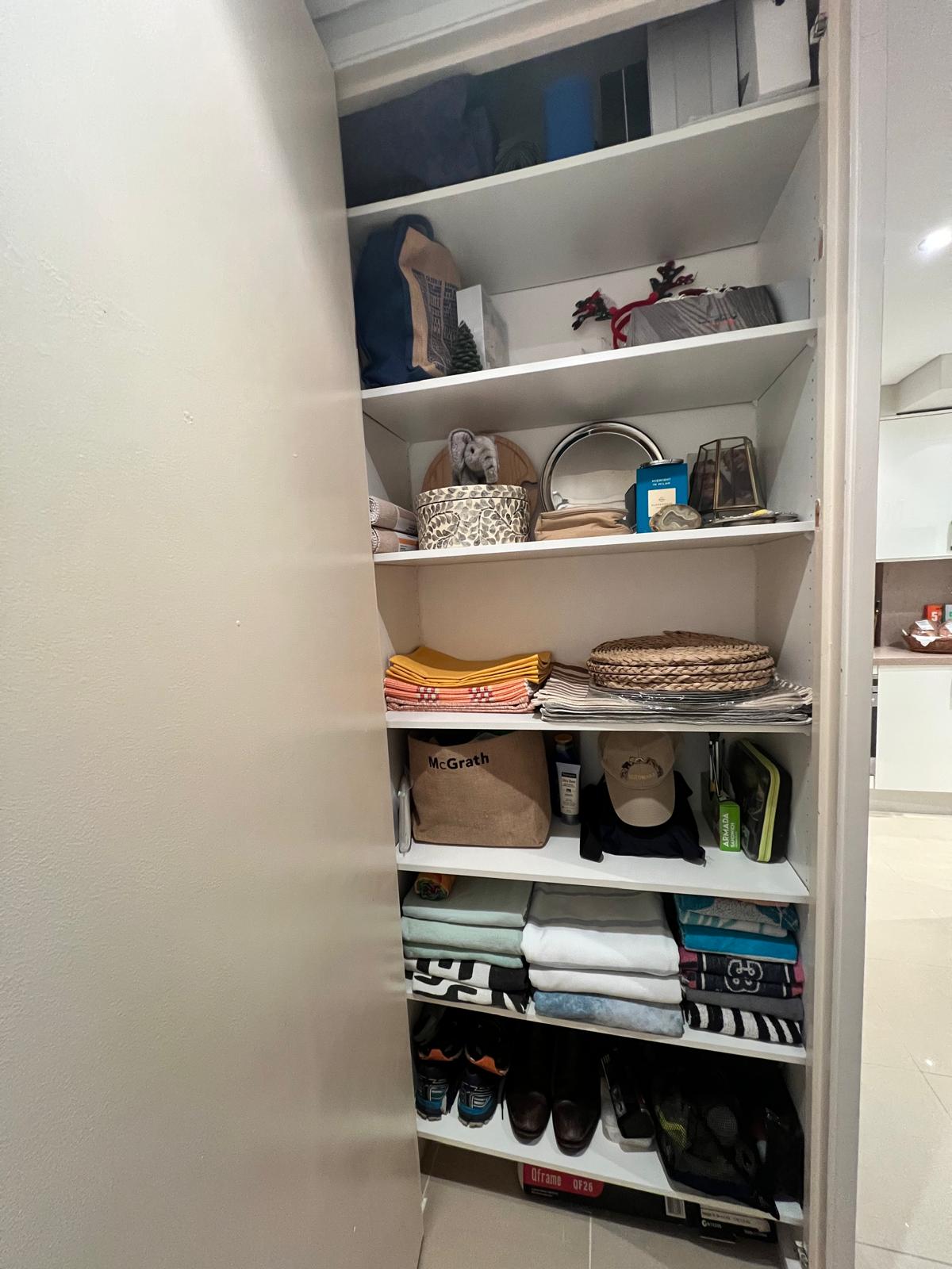 Storage closet after organizing